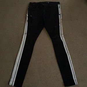 Amiri jeans with white stripes